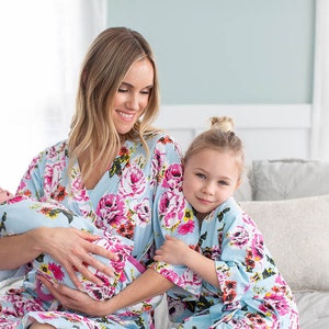 Floral maternity delivery robe with long sleeves and wrap-style front, medium length