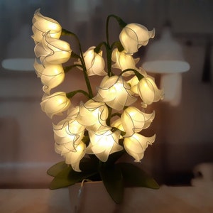 Battery flower LED lamp with lily-of-the-valley blooms, warm white glow