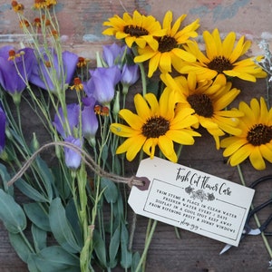 Rectangular flower-care rubber stamp, instruction text on white label (unreadable)
