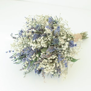 Lavender blue and white baby's breath bouquet with green eucalyptus leaves