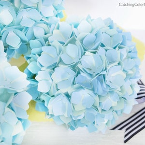 Light blue paper hydrangea flower cluster with layered petals