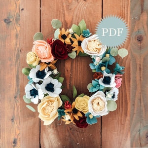 Felt flower wreath with pastel roses, peonies, and eucalyptus leaves