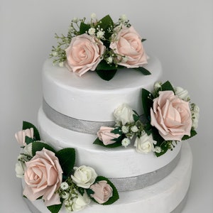 Wedding cake topper set of three blush pink rose bouquets with greenery and white blooms