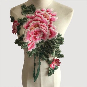 Embroidered peony floral patch applique with pink blossoms and green leaves