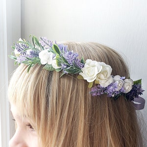 Lavender flower hair crown with white and purple blooms and leafy accents