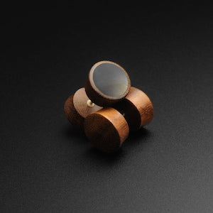 Wooden fake gauge plugs with black MOP inlay, round face