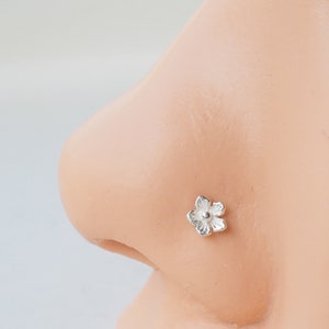 Cherry blossom sterling silver nose stud with small floral charm
