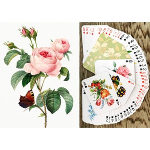 Vintage floral rose playing cards deck with patterned backs and illustrated faces