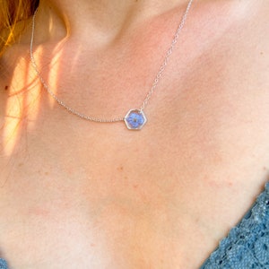 Silver choker necklace with blue forget-me-not flower pendant on fine chain