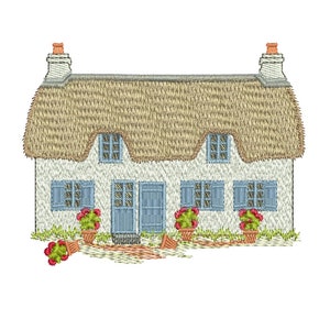 Machine-embroidered traditional cottage with blue windows, door, flowers and roof details