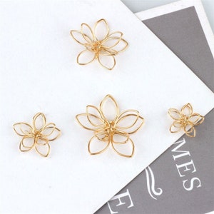 Gold-plated hollow flower pendant charm, brass, five-petal flower design