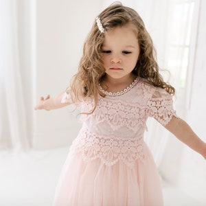 Blush toddler lace flower girl dress with floral overlay and layered tulle skirt