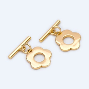 Gold-plated flower toggle clasp set: two bars with ring and circular opening
