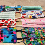 Set of colorful printed fabric face masks with animal and pattern designs