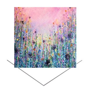 Pink-sky greeting card with colorful wildflower meadow artwork