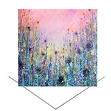 Pink-sky greeting card with colorful wildflower meadow artwork