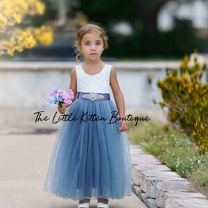 Blue tulle flower girl dress with lace bodice and satin waistband, sleeveless