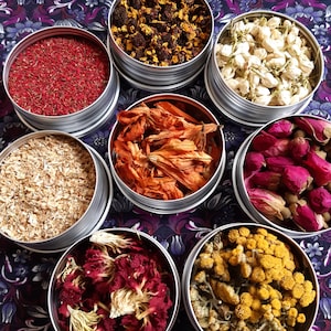 Resin jewelry craft set with assorted dried flowers and petals in small metal tins