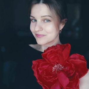 Large red fabric flower brooch with rosette and pin back