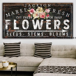 Vintage farmhouse wall sign: FLOWERS text with floral accents