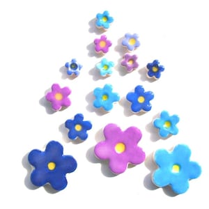 Ceramic flower mosaic tiles, small blue and purple blossoms with yellow centers