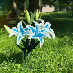 Blue and white flower cosplay prop with metal stand