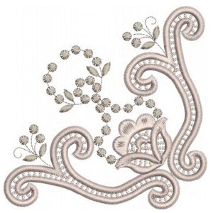 Embroidered cutwork corner motif with leaf wreath, bird, and scroll accents in beige thread