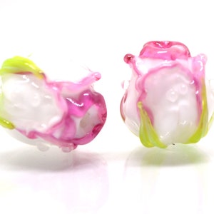 Lampwork glass rosebud beads, pink with white centers and green tips