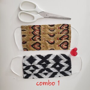 Pack of 2 cotton face masks, one patterned brown and one black-and-white zigzag