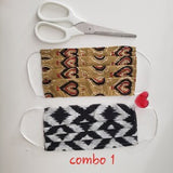 Pack of 2 cotton face masks, one patterned brown and one black-and-white zigzag