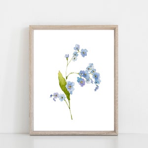 Framed watercolor floral art print featuring blue forget-me-nots