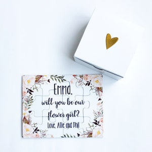 Floral proposal gift box with card: “Emma, will you be our flower girl?” gold heart