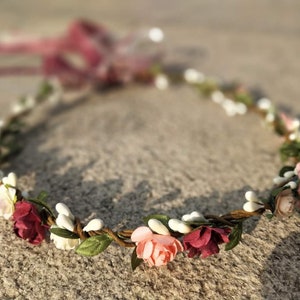 Flower crown headband with burgundy and pink fabric flowers and leafy accents