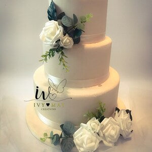 Wedding cake floral topper set with white foam roses and eucalyptus leaves