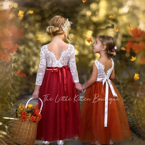 Girls lace and tulle flower girl dress with white sleeves and burnt orange tulle skirt