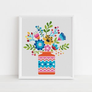 Lucie Heaton cheerful flowers cross stitch pattern showing floral bouquet in striped vase
