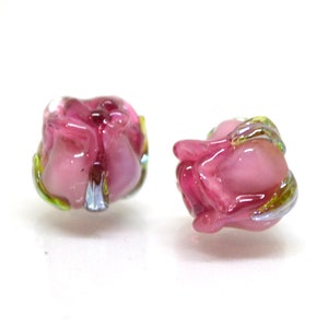 Pink rosebud lampwork glass beads with green accents, pair