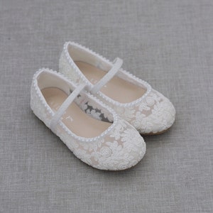 White crochet lace Mary Jane flats with ankle strap and mini pearl accents