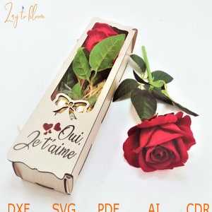 Laser-cut wooden rose gift box with open lid and attached red rose with green leaves