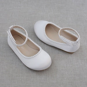 White satin flats for girls with mini pearl trim and Mary Jane strap