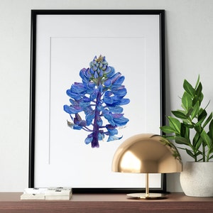Framed blue lupin watercolor print with botanical stem and petals