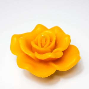 Yellow beeswax rose floating candle with layered flower petals