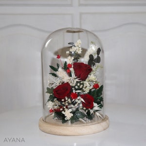 Glass bell gift with preserved red and white roses under a clear dome