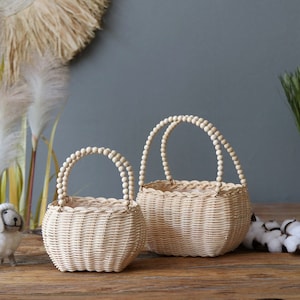 Hand-woven willow flower girl basket set with two small rustic baskets, light tan