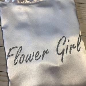 Silver satin robe with black 'Flower Girl' script