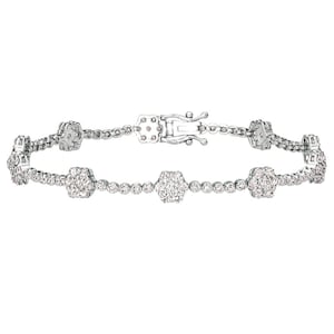 White gold diamond flower bracelet with linked oval and round cluster settings