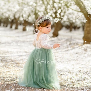 Sage green flower girl dress with cream lace bodice, long sleeves, and tulle skirt