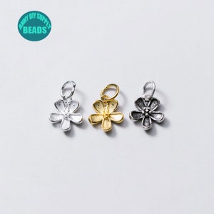 Small flower charm pendants with silver-tone metal and top loop for jewelry