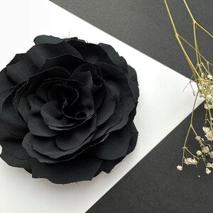 Black fabric flower brooch pin with layered petals