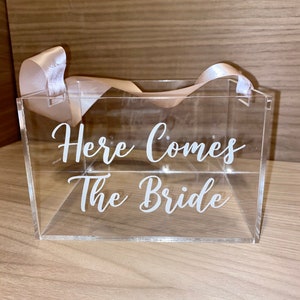 Clear acrylic gift basket box with white ribbon and 'Here Comes The Bride' print